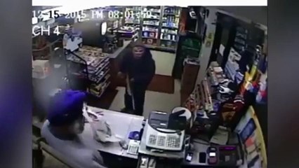 LiveLeak - Fuel station worker fights off gun toting robber with shoe