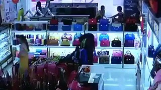 Chinese toddler falls 8 meters from shopping mall escalator.mp4