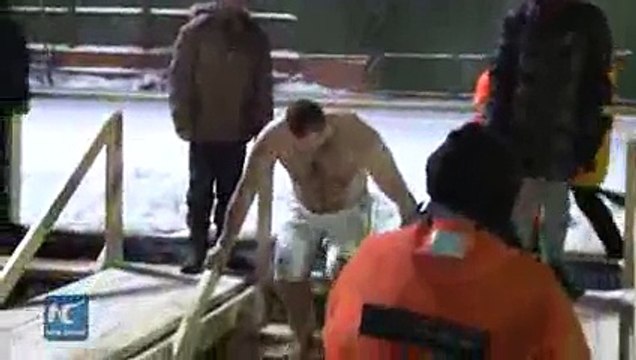 RAW Russians take icy water bath to celebrate Orthodox Epiphany 2016