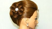 Hairstyle for medium long hair. Updo with braided flower