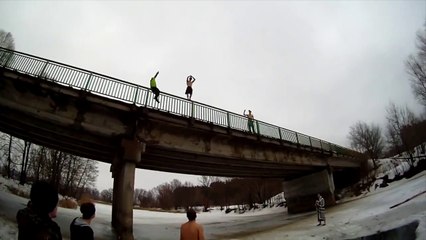 Backflip off a bridge into frozen lake!!