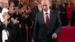 Vladimir Putin walks with a gunslingers gait, in which his right arm has little swing