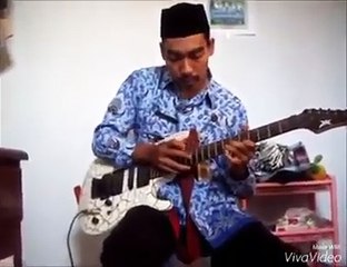 awesome indonesian muslim teacher playing guitar