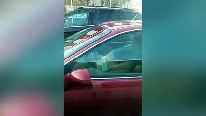 This guy is waiting for his wife in his car - what he does next is truly di5gusting