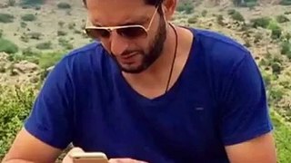 Shahid Afridi and his Phone