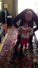 Little Girl Falls Over in Rain Boots