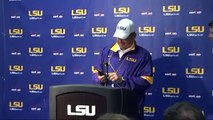 Les Miles Answers Reporters Phone During Presser
