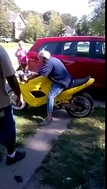 Grandma is not scared of a motorcycle