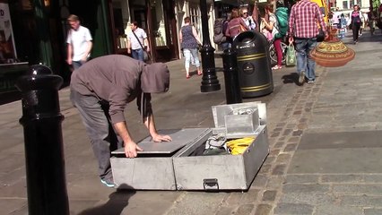 Download Video: Silver man secret revealed London street performer, floating and levitating trick