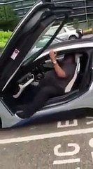 Fat man stuck inside the car