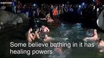 Russians brave snow for icy Epiphany dip - BBC News