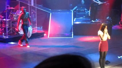 Trey Songz with a fan on stage, Manchester.