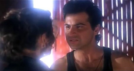 Madhuri Dixit in black bra opens shirt, scene from RAJA