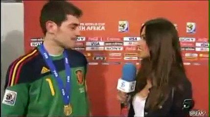 spanish goal keeper kisses a hot reporter.