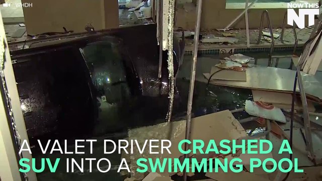SUV Crashes Into Swimming Pool