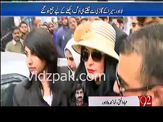 Meera applying perfume before entering inside court