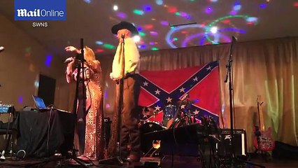 Bruce Jones performs on stage in front of Confederate flag _ Daily Mail Online