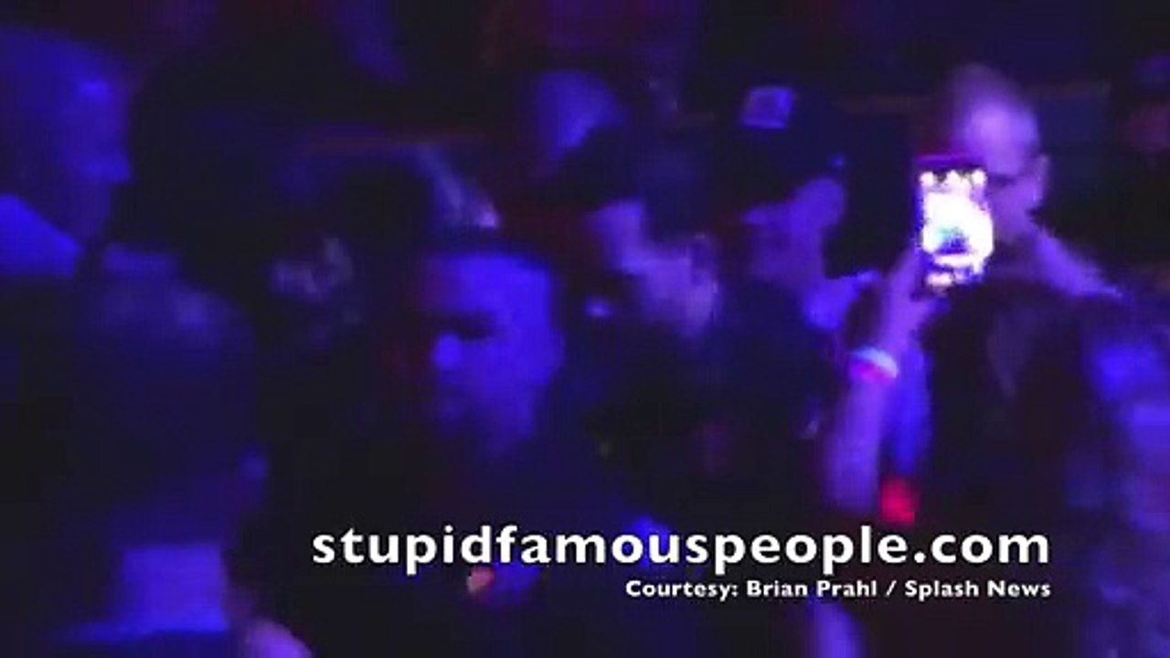 Justin Bieber trips & falls over a chair at J.Lo concert