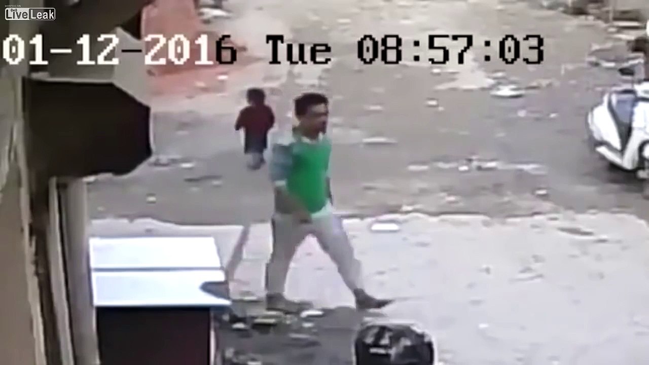 Kid trips up & gets ran over