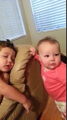 Too cute: Sister wakes up brother
