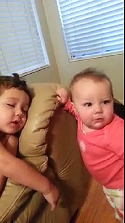 Too cute: Sister wakes up brother