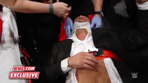 Triple H helped by paramedics after being attacked by Roman Reigns׃ WWE.com Exclusive, Dec. 13, 2015