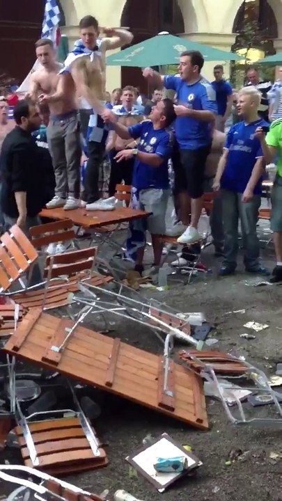 Chelsea hooligans trashing a Bar in Munich and...