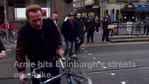 Arnold Schwarzenegger cycles wrong way down Edinburgh street - BBC News