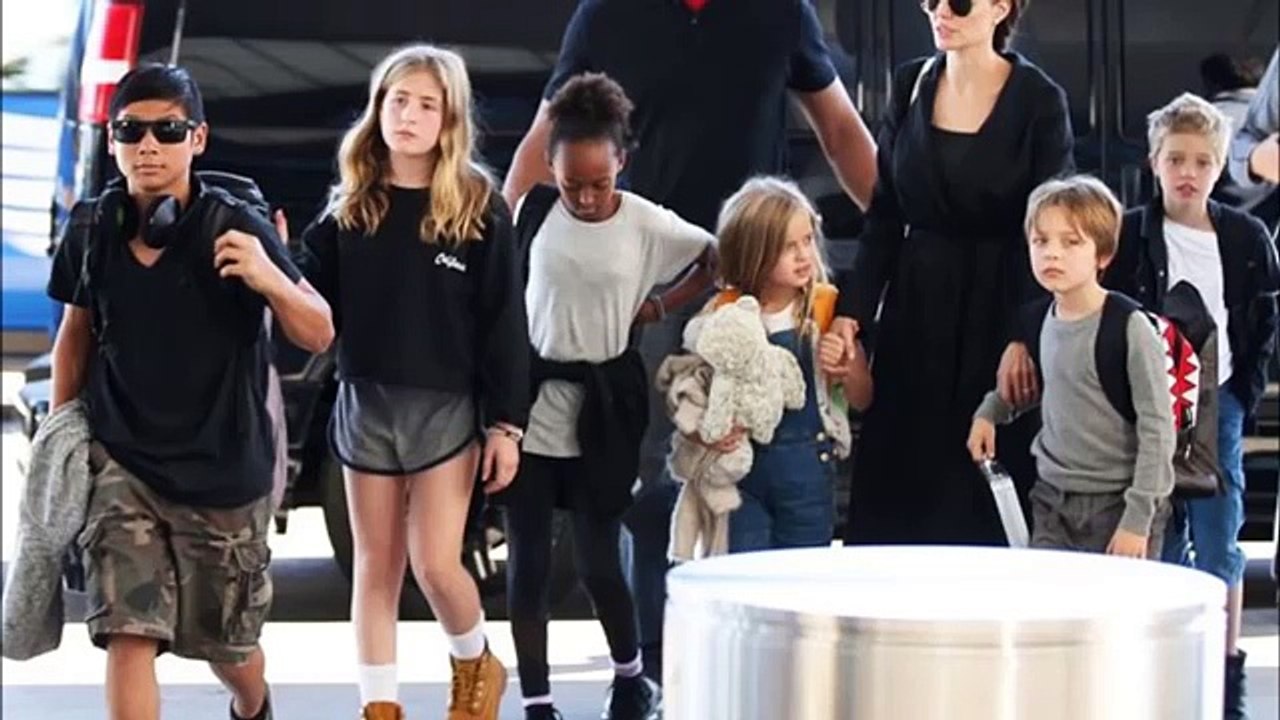 Angelina Jolie and Children Hit the Airport After By The Sea Premiere in LA