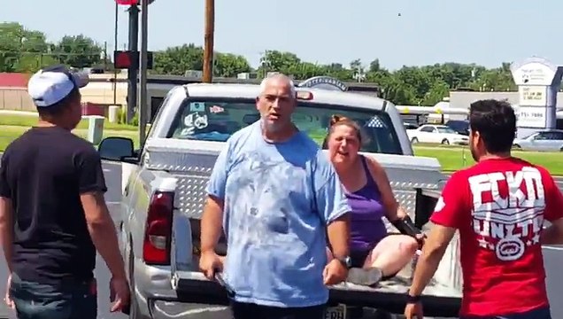 Crazy Man beats Woman in Parking Lot gets stopped by young Men helping her!
