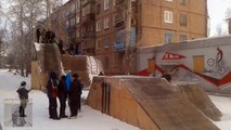 Russian children ride down Skateboard BMX Iced Ramp in the winter