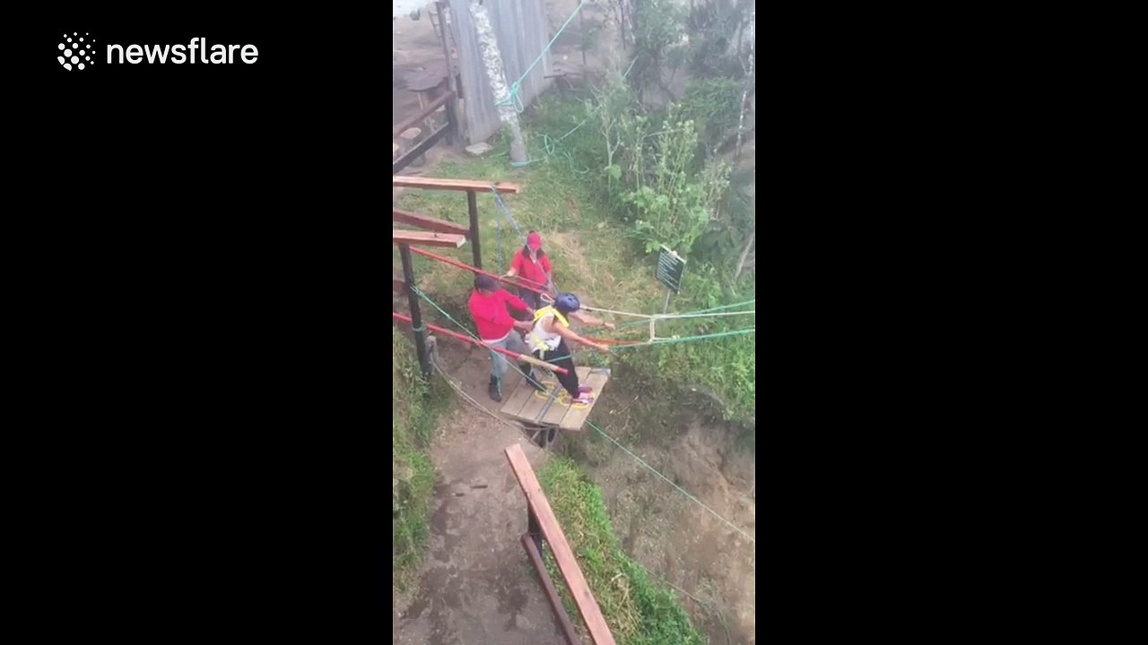 Amazing swing ride out over massive drop