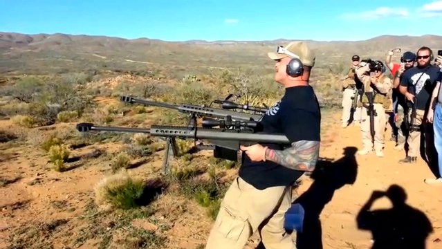 Dual Wielding Two Barrett 50 Cal Sniper Rifles