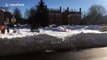 Snowboarding on the streets of Washington DC on the back of a Jeep