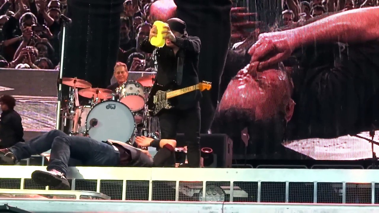 Bruce Springsteen Berlin Wrecking ball tour 2012-05-30 man with pants off rushing stage