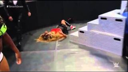 Tamina Snuka Superkicks Nikki Bella outside the ring, June 25, 2015