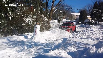 Pick-up truck utterly destroys snowman