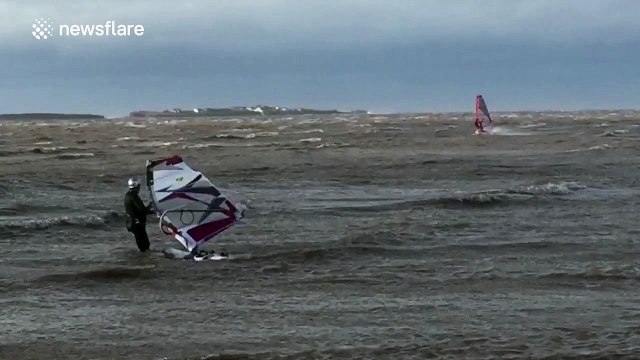Windsurfers brave Storm Jonas winds off the UK coast