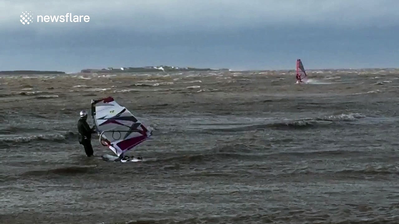 Windsurfers brave Storm Jonas winds off the UK coast