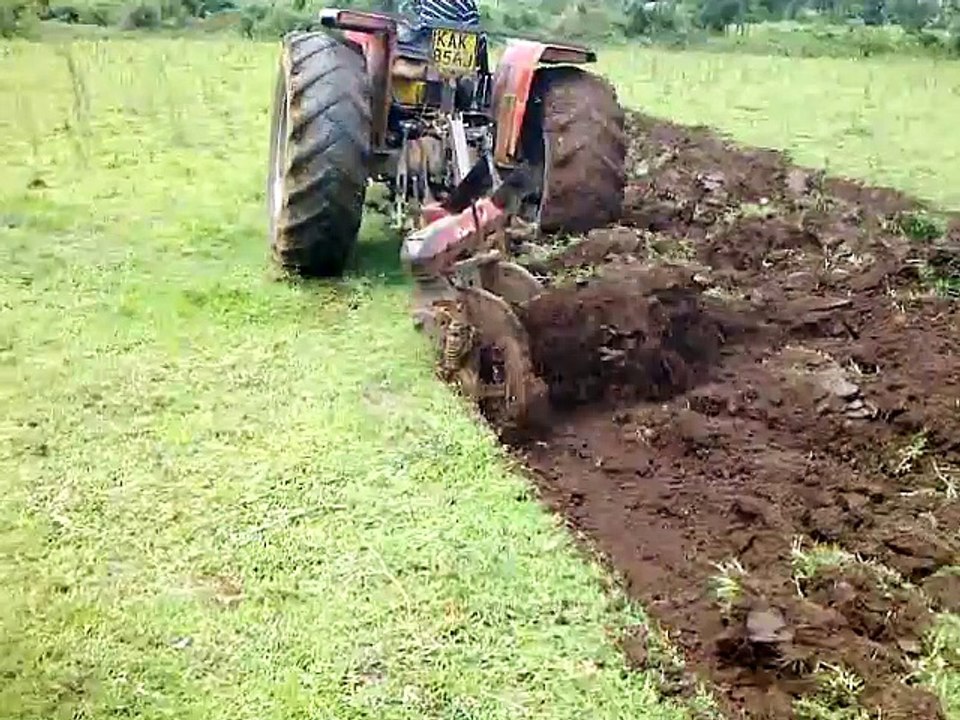Cheap Massey Ferguson MF 375 Tractor with Disc Plough for sale.