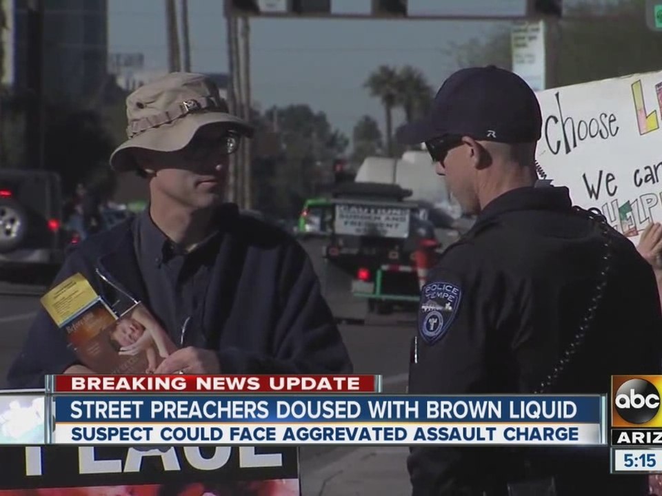 Brown liquid thrown at Planned Parenthood protesters