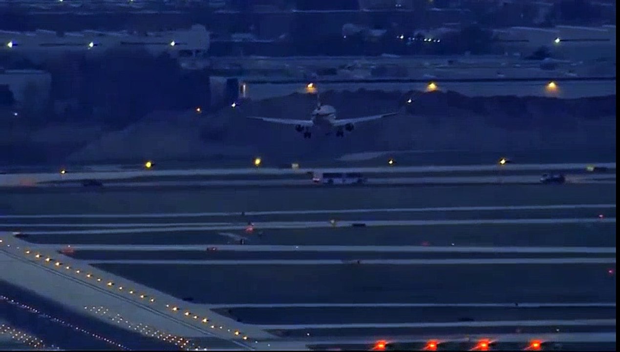 A plane lands during windy conditions Thursday at O'Hare International Airport  Crosswind Landing