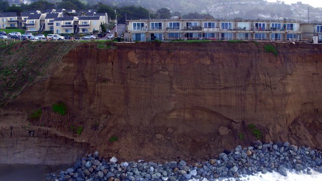 Cliffside apartment buildings are about to fall into Water near San Francisco.