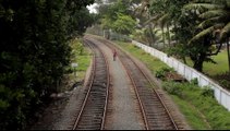 Drunk Guy nearly gets hit by train! stupid people