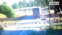 Truck stuck on Railway ... So violent crash but so lucky driver