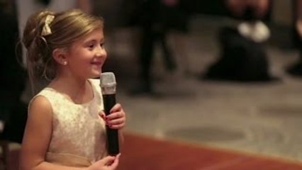 6-Year-Old Flower Girl Surprises Bride and Groom with Adorable Performance