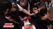 Triple H helped by paramedics after being attacked by Roman Reigns WWE.com Exclusive, Dec