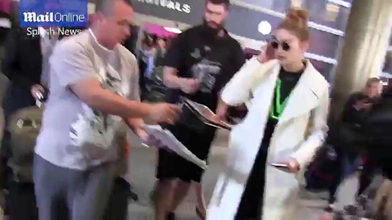 Gigi Hadid is stylish in sunglasses as she touches down at LAX _ Daily Mail Online