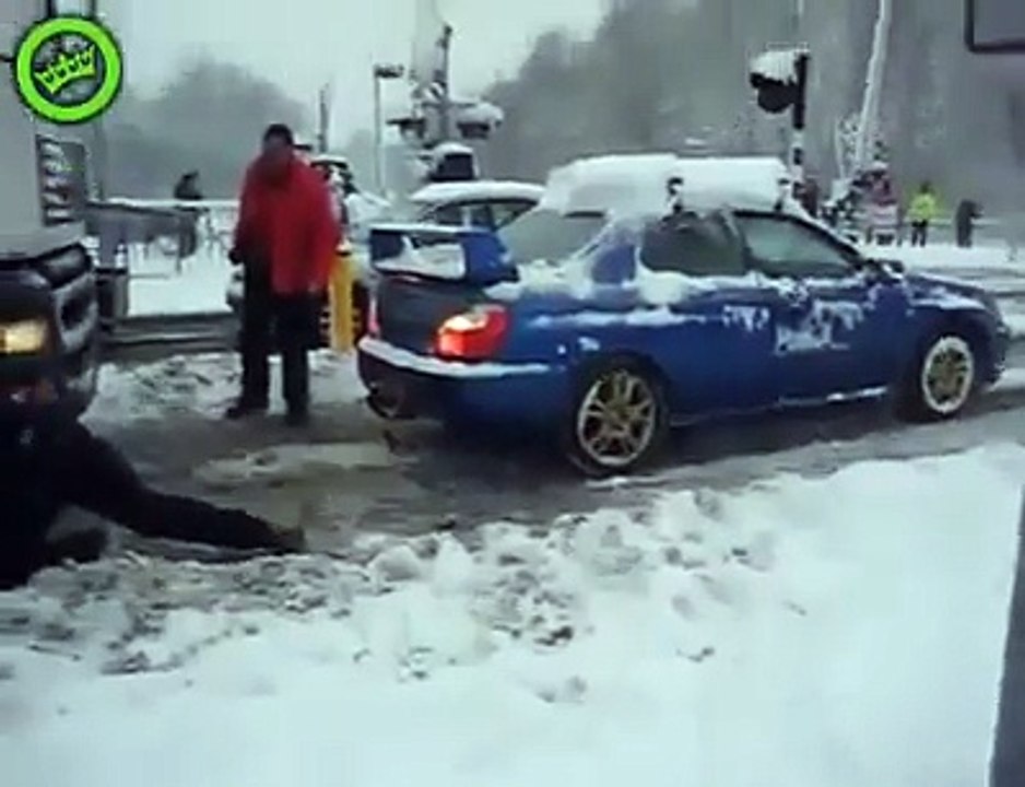 SUBARU IMPREZA WRX STI PULLS TRUCK OUT OF SNOW