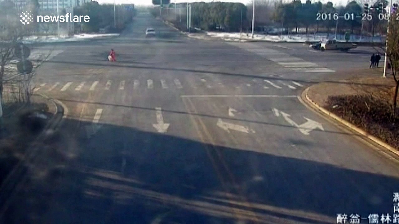 Electro-tricycle has nasty crash with SUV at crossroads